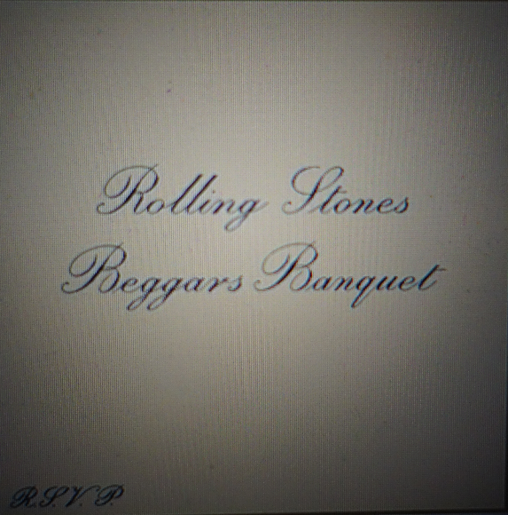 Elaborazione fotografica della copertina originale dell'album "Beggars Banquet" (1968) dei Rolling Stones.